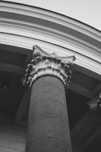 grayscale photo of pillar